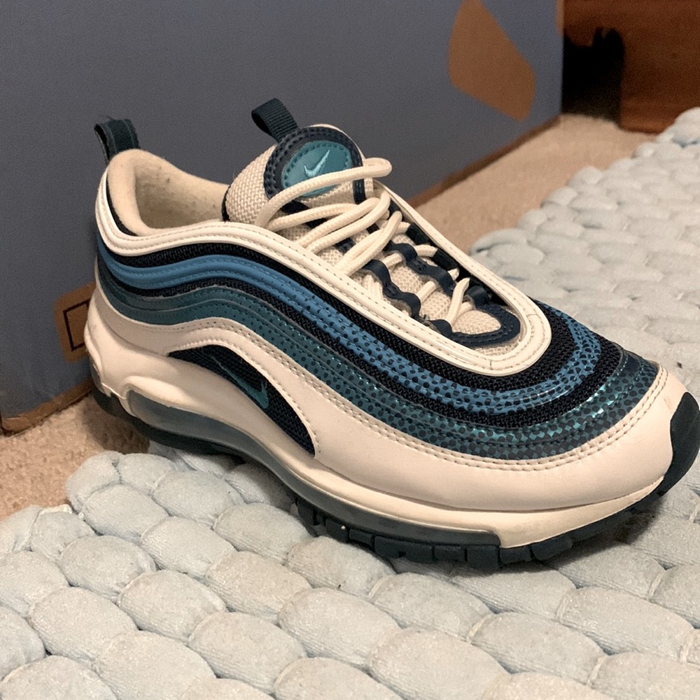 These are my sons shoes and they are to tiny for him and they are slightly wore